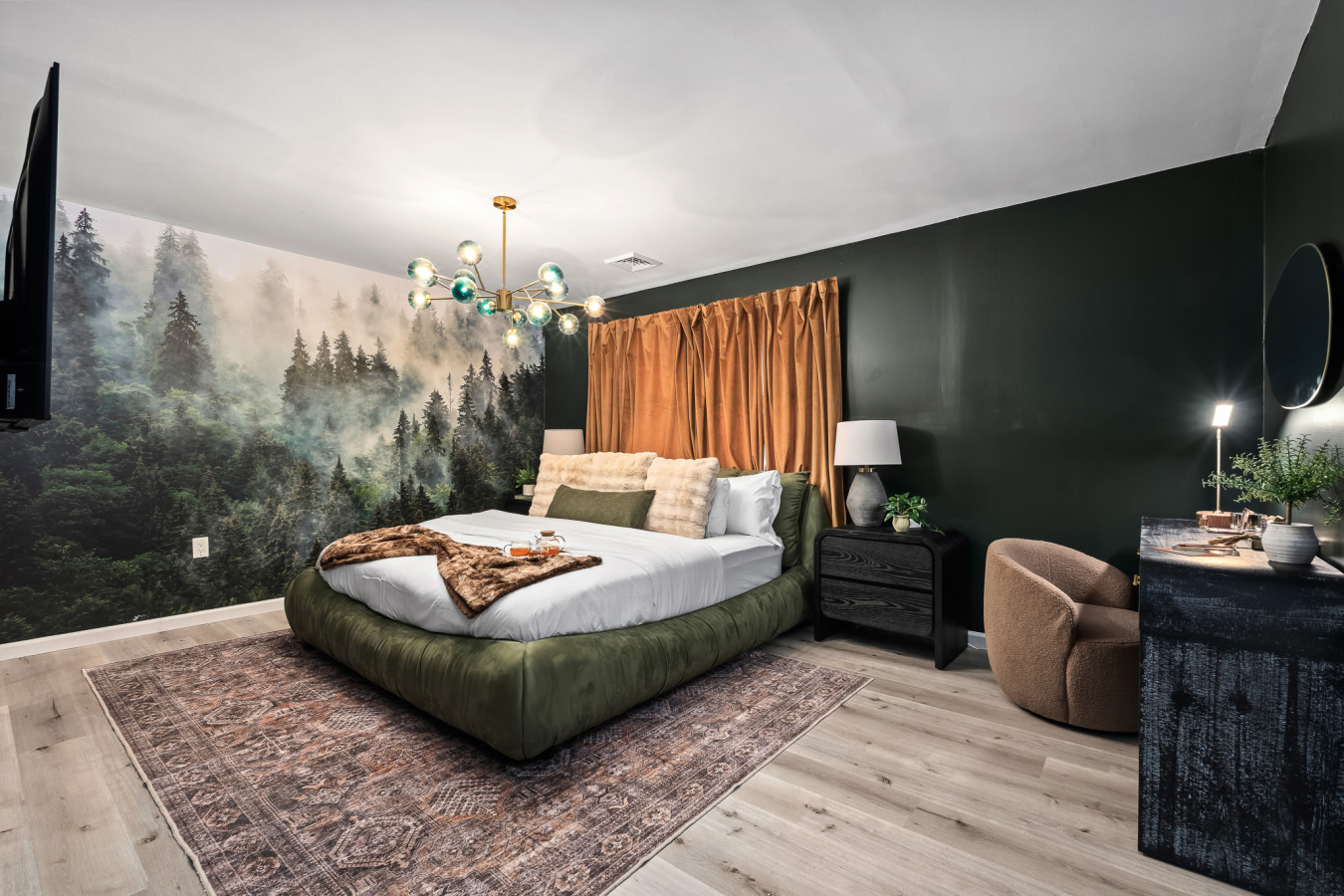 Expansive master bedroom featuring a plush king bed and a private en-suite bath—your personal haven for rest and relaxation.