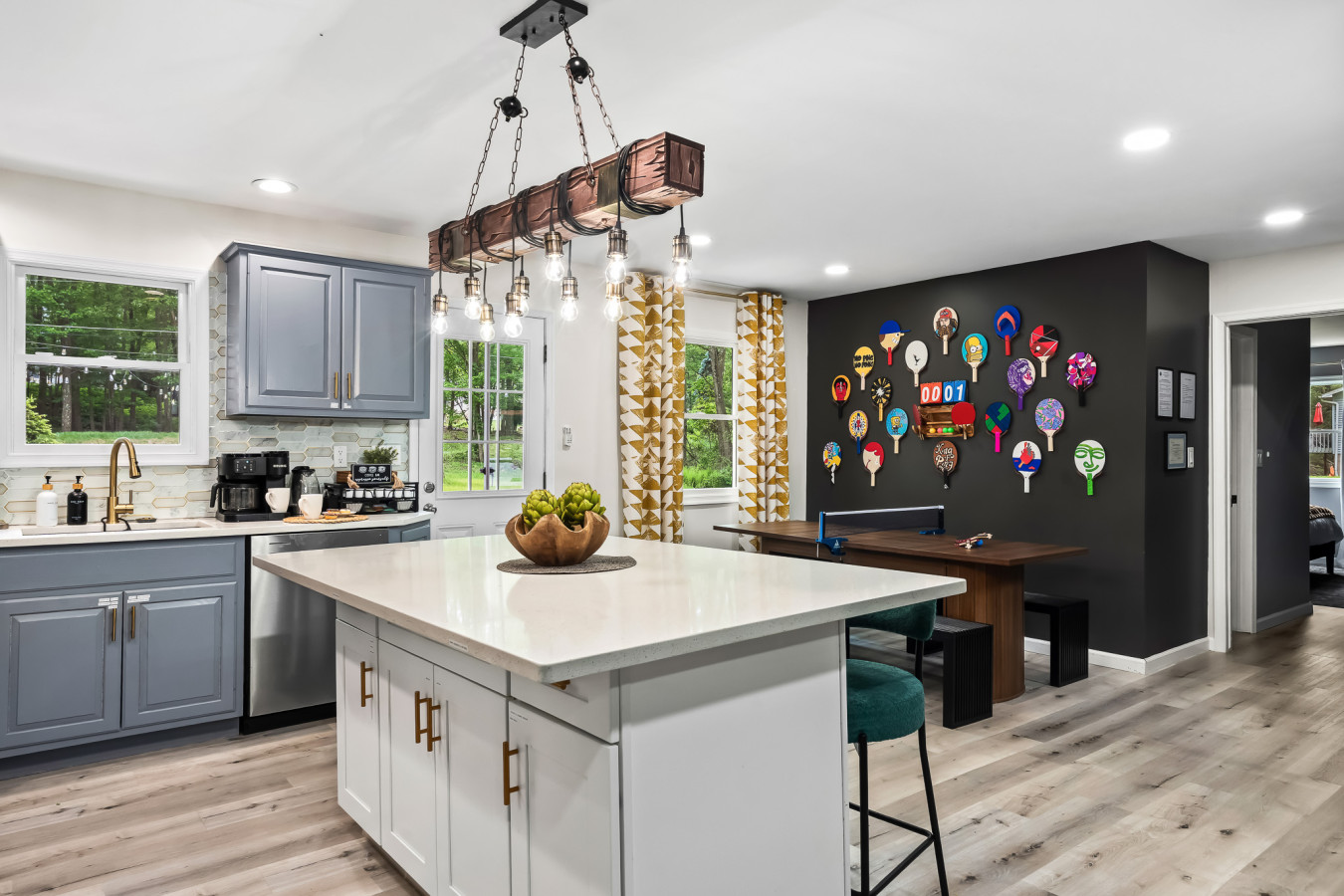 Spacious kitchen island with extra seating—perfect for casual dining, morning coffee, or keeping the chef company while meals are prepared.