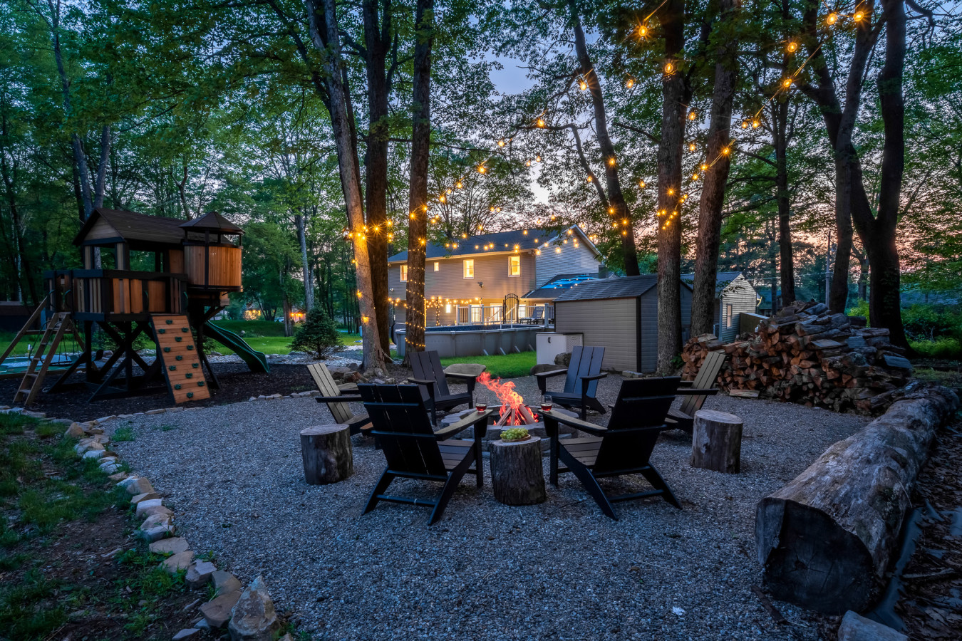Gather around the firepit under the magical twilight sky — the perfect spot to relax, unwind, and make lasting memories.