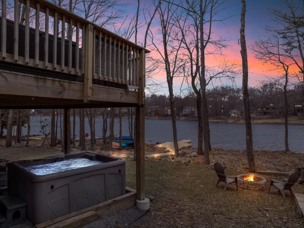 Relax and unwind in the hot tub beneath the deck, with stunning lake views all around. The perfect spot to enjoy a soothing soak while taking in the beauty of nature.