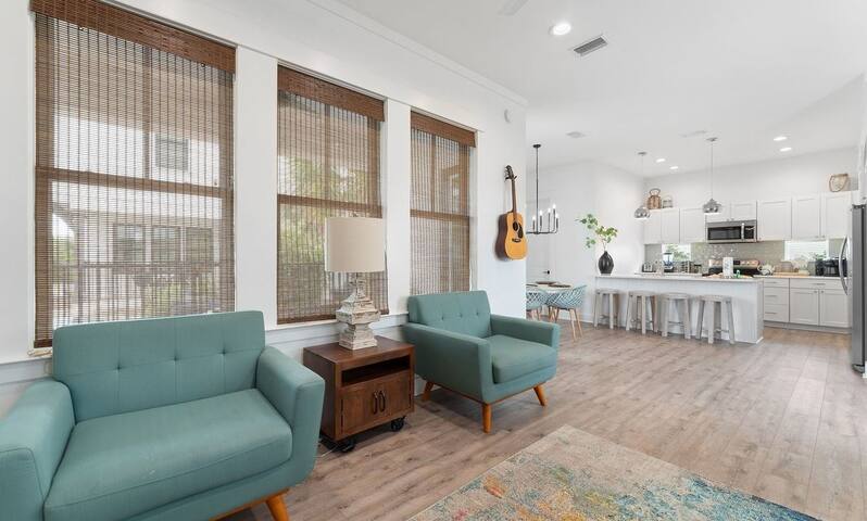 Large chairs perfect for watching TV, conversations, or playing guitar (additional guitar is upstairs).