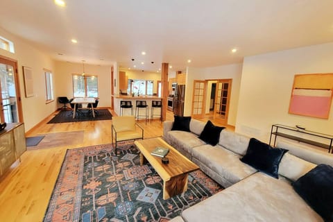The living room, dining room, and kitchen