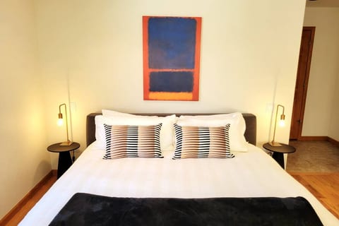 The master bedroom with a king bed