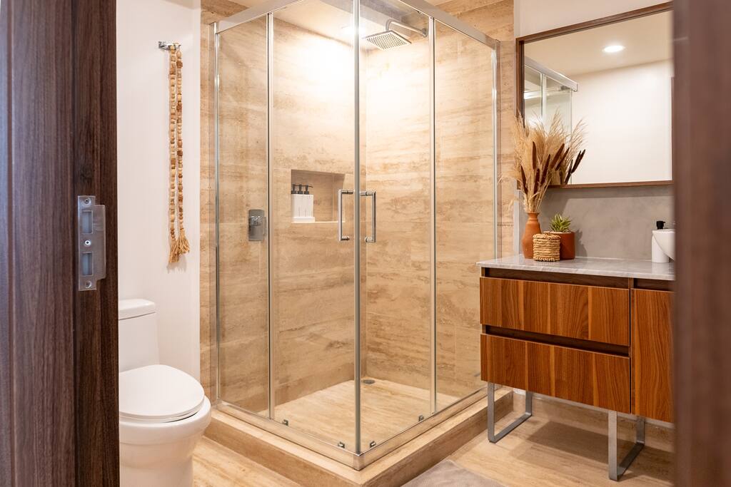 Modern bathroom equipped with a rainfall shower