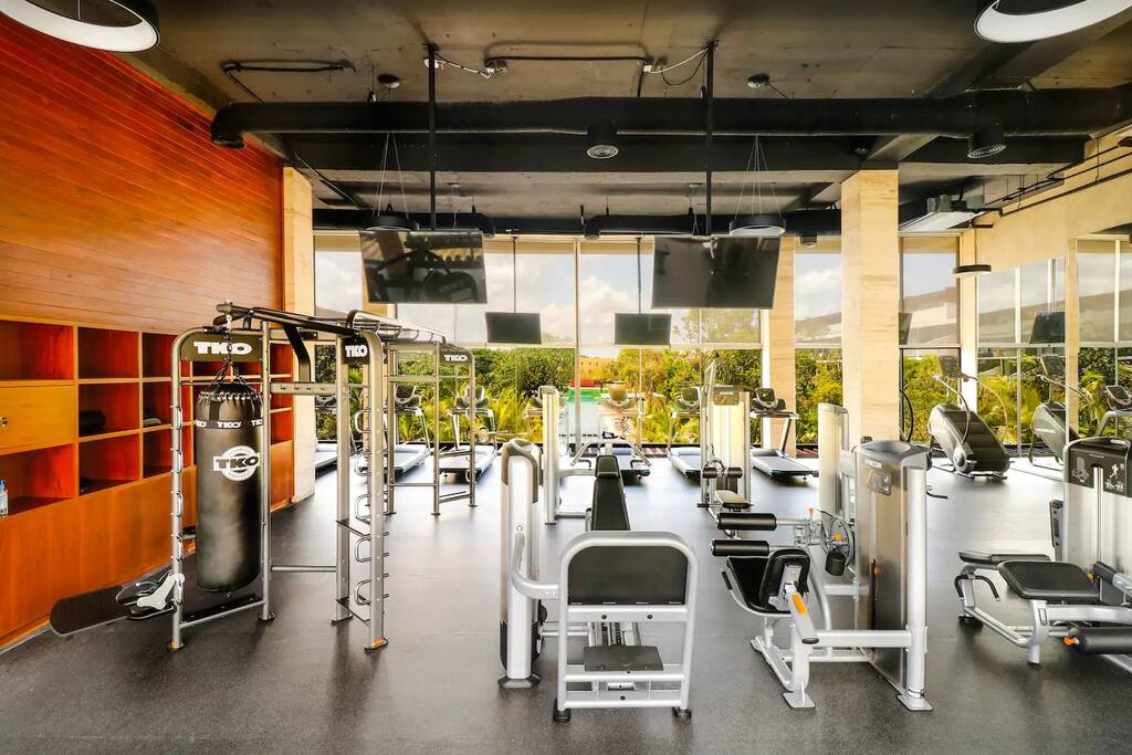 Modern, air-conditioned gym equipped with the latest gear