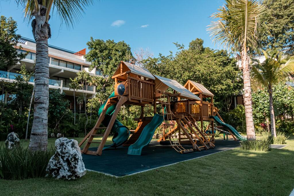 Fun-Filled Children's Playground with Swings, Slides, and More