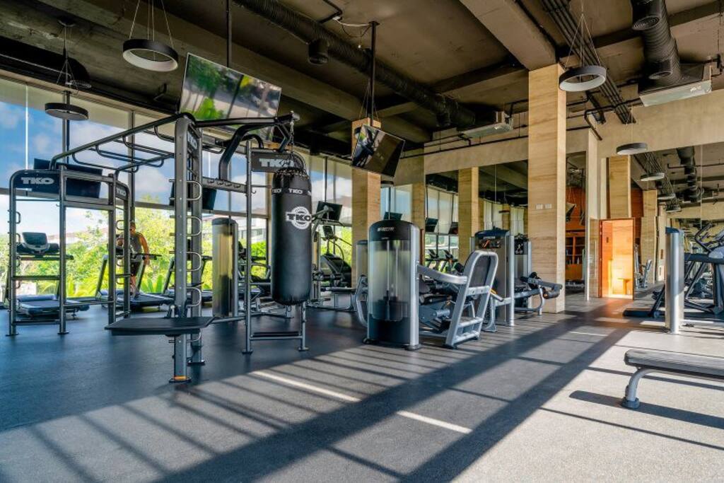Modern, air-conditioned gym equipped with the latest gear