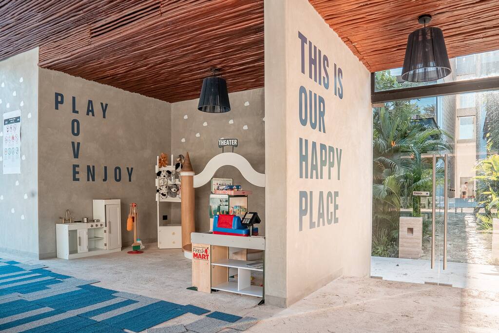 Charming Indoor Kids' Playroom with Mini Kitchen, Adorable Movie Theater - 'Our Happy Place'