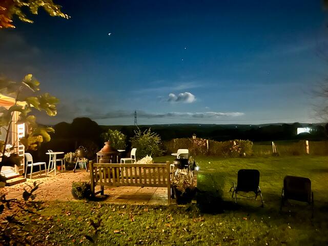 The shared area of the garden with the fire pit is perfect for star-gazing.