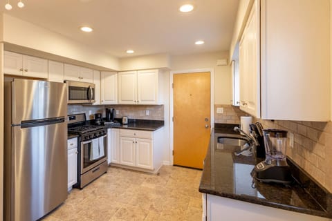 Cook your favorite meals in this newly renovated kitchen that is fully stocked with cookware, featuring stainless steel appliances, dishwasher, herbs & spices, and more!