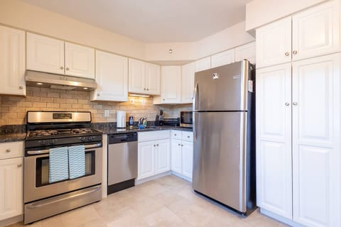 Cook your favorite meals in this recently renovated kitchen that is fully stocked with cookware, featuring stainless steel appliances, dishwasher, herbs & spices, and more!