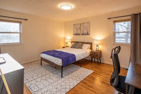The 1st bedroom features a Queen-sized bed with luxurious foam mattress, blackout curtains, noise machine, ear plugs, and more to ensure you have the most comfortable sleep! An office workstation is perfect for those who work from home.