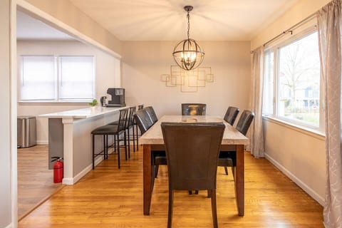 The dining room features seating for 9
