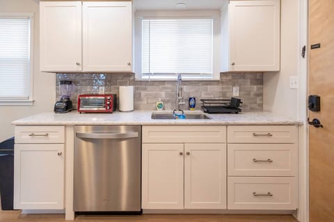 Cook your favorite meals in this newly renovated kitchen that is fully stocked with cookware, featuring stainless steel appliances, dishwasher, toaster oven, and more!
