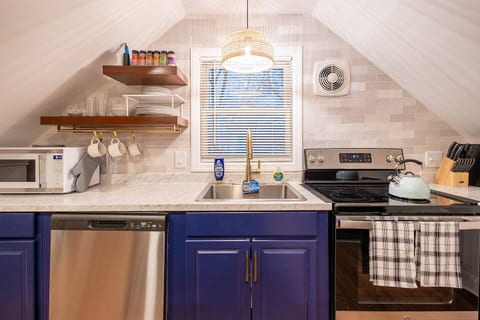 Don't be deceived! This kitchen is fully stocked with all of the appliances and cookware needed to make any kind of meal!