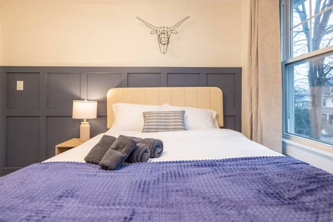 The 2nd bedroom features a Queen-sized bed with luxurious foam mattress, blackout curtains, noise machine, ear plugs, and more to ensure you have the most comfortable sleep! An office workstation is perfect for those who work from home.