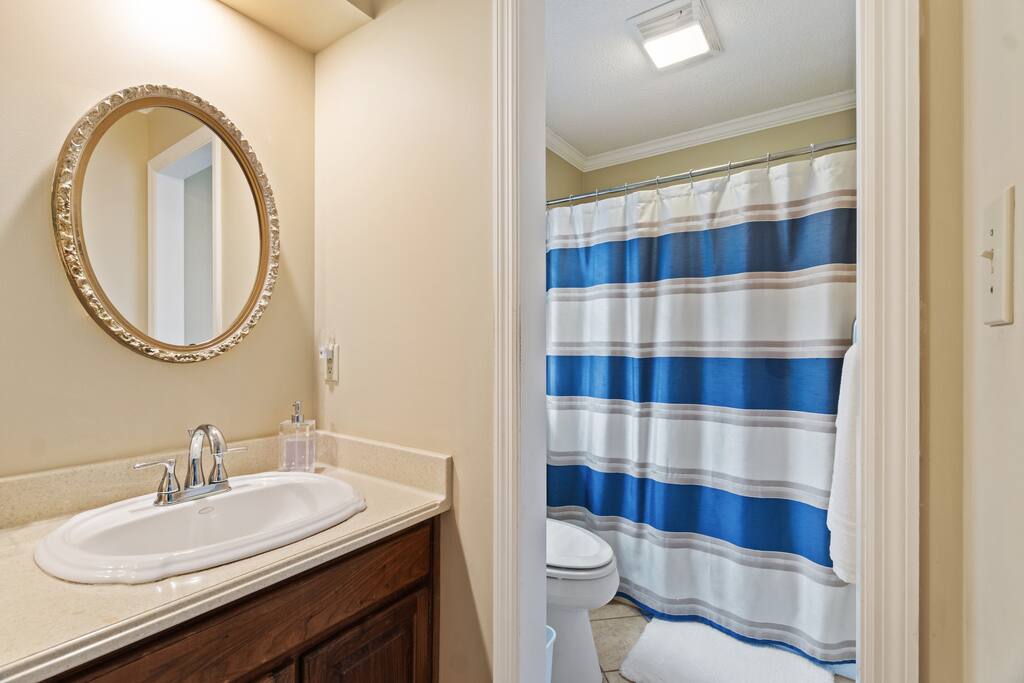 This is the primary bathroom, conveniently located as an en-suite to the main bedroom on the main floor.
