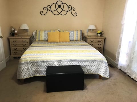 Master Bedroom w/King Bed, 26" TV. French Doors with Seasonal Views