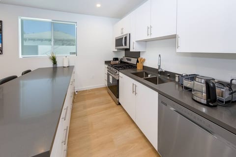 Modern 2BR Back House w/ TVs & Full Kitchen