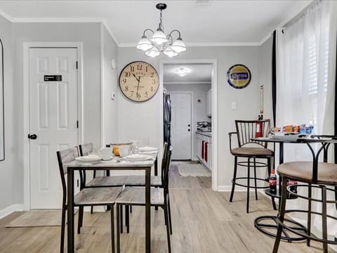 Cozy dining area with seating for 4—great for meals, games, or conversation