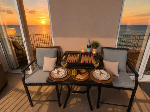 Enjoy dinner on your private balcony while the sun sets over the Gulf.