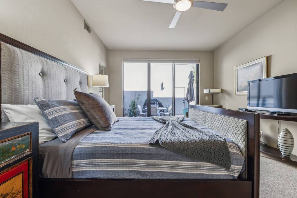 Discover the spacious first bedroom, your perfect getaway! With a comfy bed and elegant decor, it’s designed for relaxation. Enjoy abundant natural light and plenty of storage, making it a welcoming retreat for restful nights after your adventures!