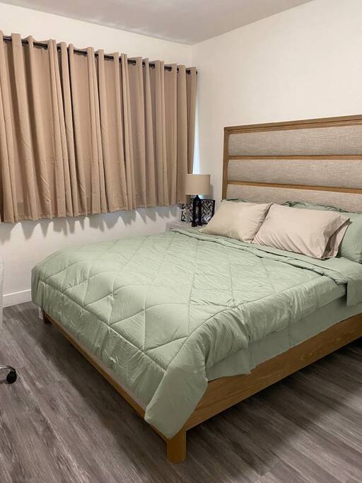 Relax and recharge in this cozy, inviting bedroom – your peaceful retreat with all the comforts you need for a restful stay.