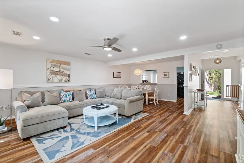 The living room has a smart tv and cable with its own sliding door giving access to the deck.