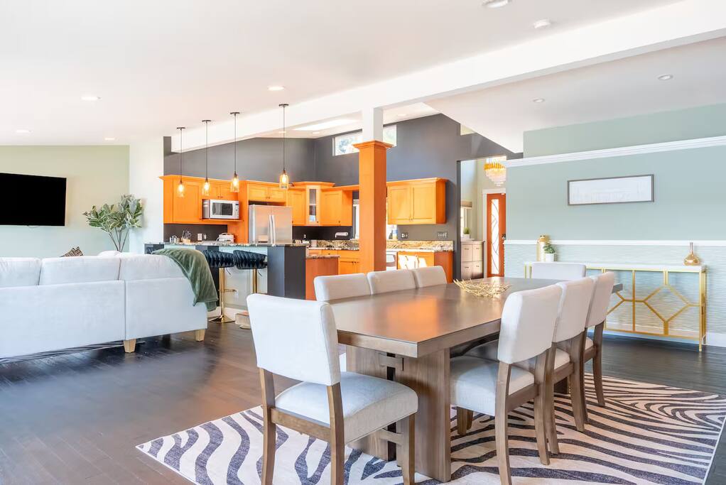 Gather around in the spacious dining room with comfortable seating for 8—perfect for family meals, group dinners, or game nights. With plenty of natural light and a welcoming vibe, it’s an ideal spot to share food, stories, and unforgettable moments