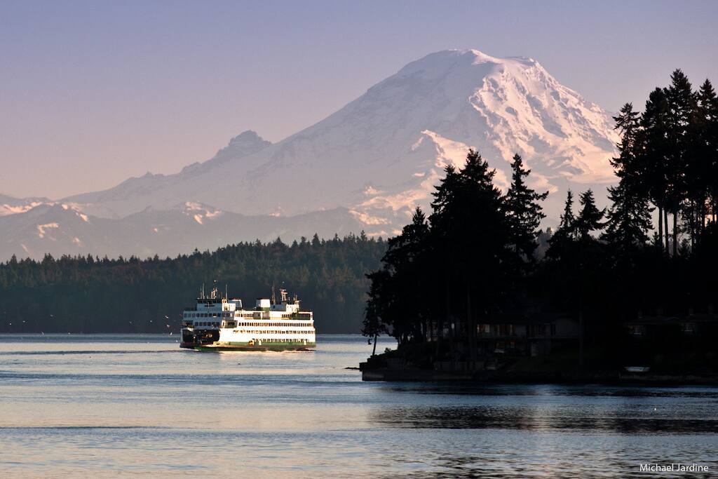 The Bremerton Ferry sails beneath the towering majesty of Mt. Rainier—an unforgettable Pacific Northwest view.
