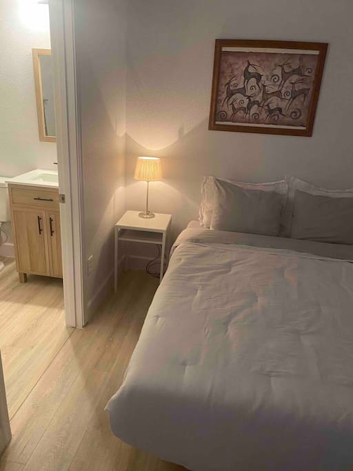 small bedroom and bathroom.