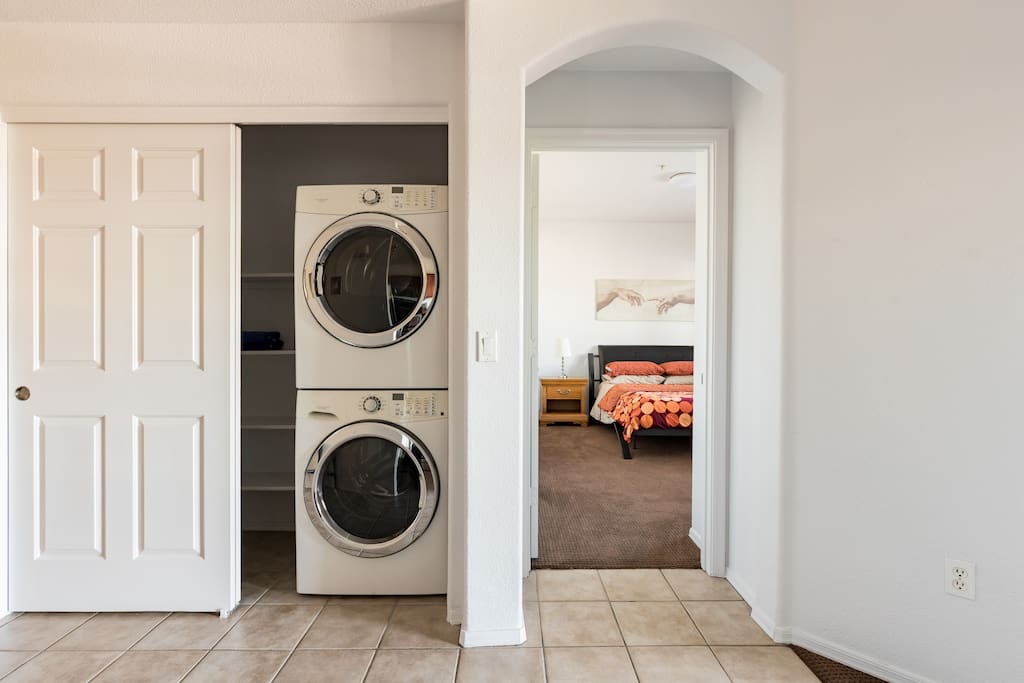 laundry next to the master bedroom in hallway.