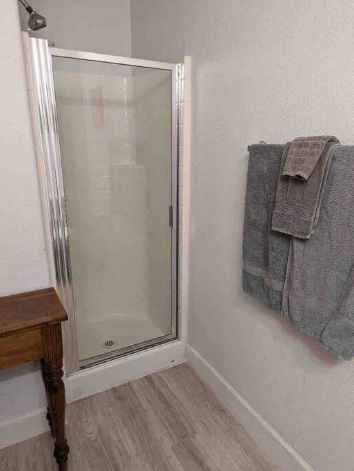 Shower in small bathroom.