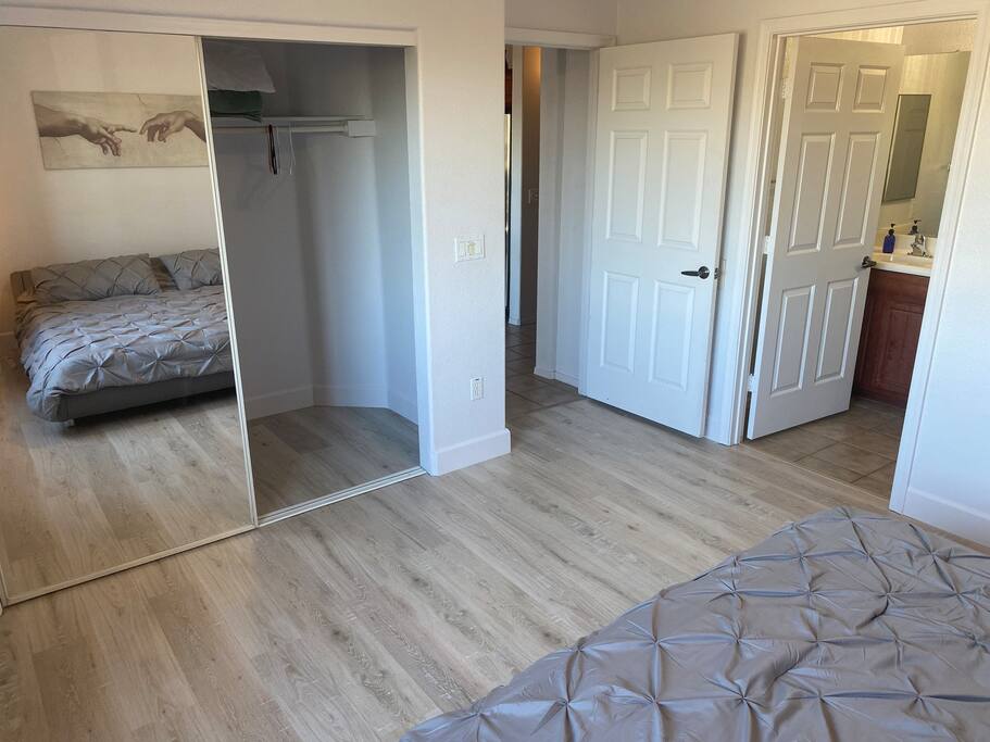 King size bed in the Master Bedroom with Hardwood floors.