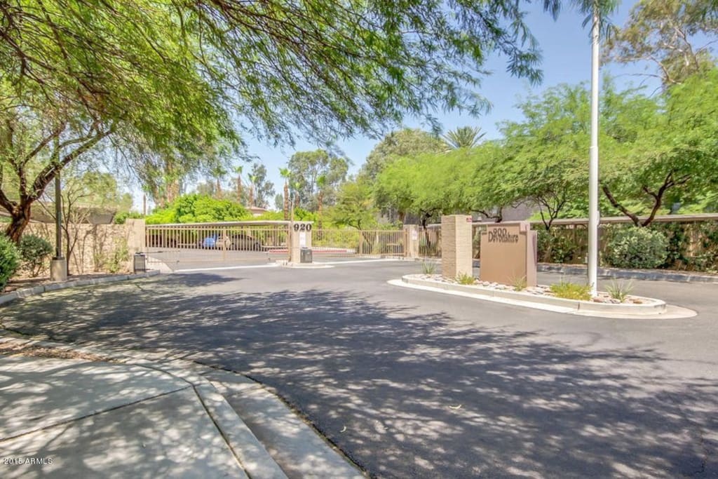 Entrance from the street where the gate code or fob is required to enter