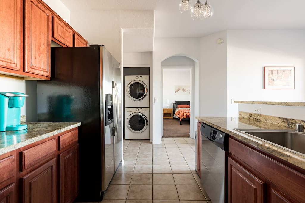 Kitchen with laundry and master bedroom.