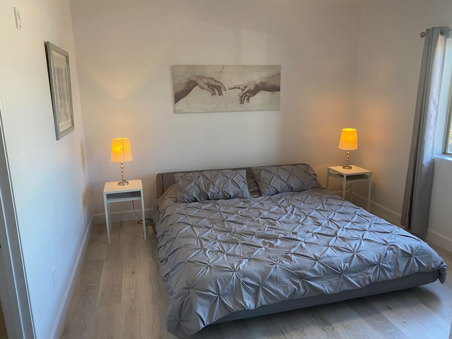 King size bed in the Master Bedroom with Hardwood floors.
