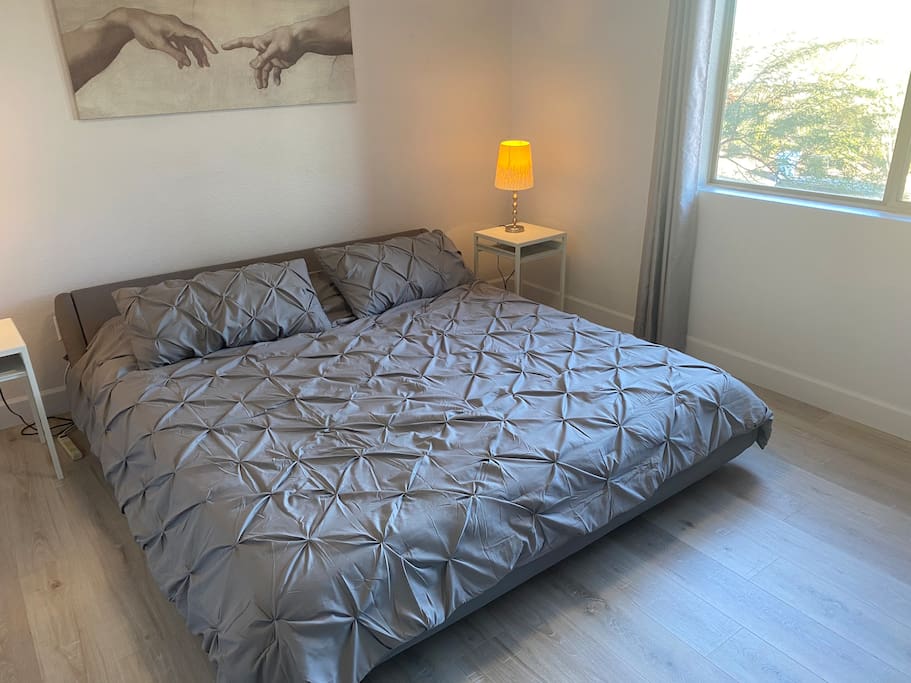 King size bed in the Master Bedroom with Hardwood floors.