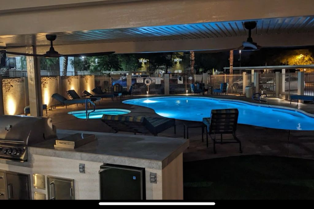 BBQ grill next to the pool and Hot tub.