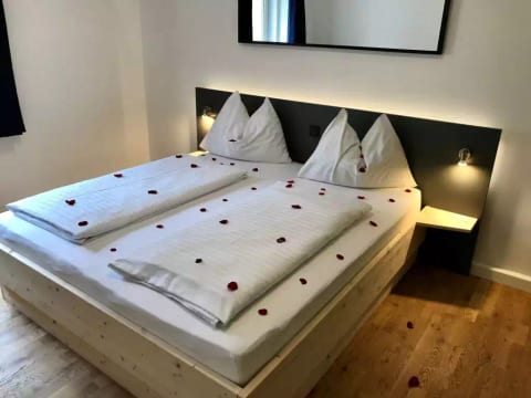 für bis zu 4 Personen mit Sprudelwanne