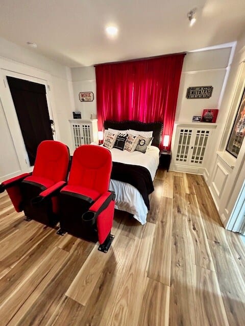 Cinematic Stay: 100-inch Screen & Popcorn Delight