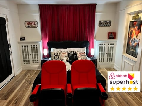 Cinematic Stay: 100-inch Screen & Popcorn Delight