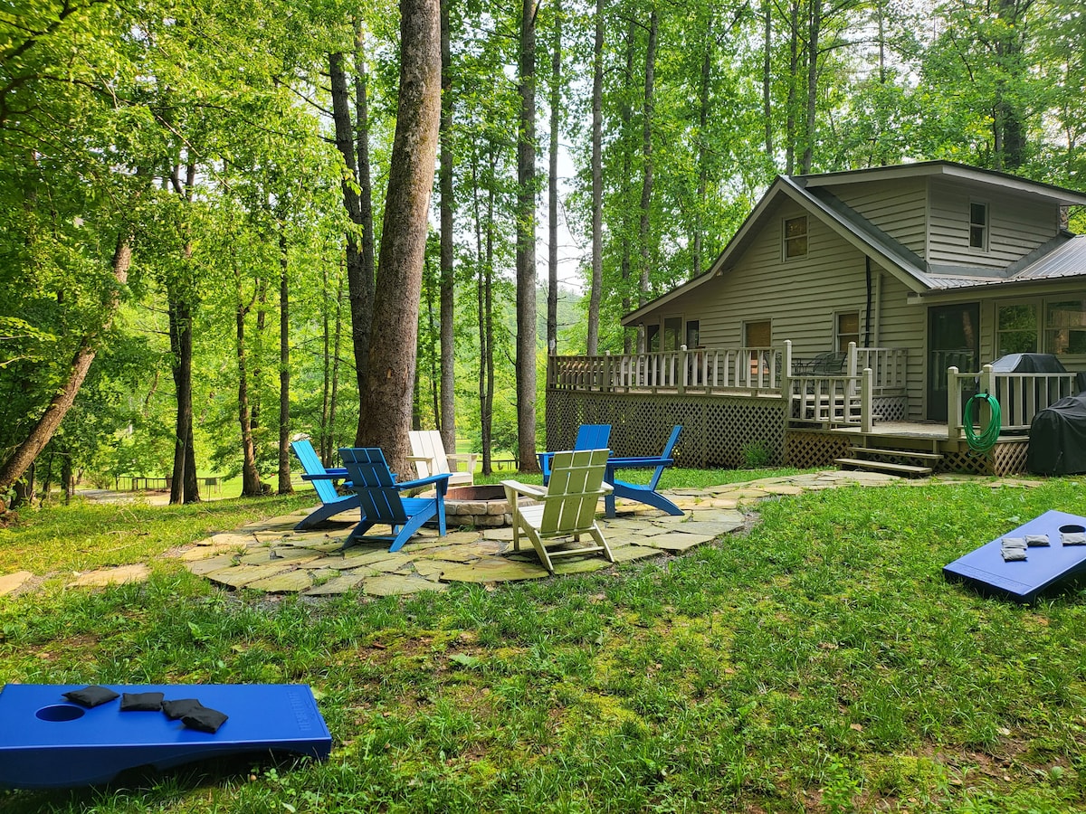 Firepit, deck, propane grill, charcoal grill, and dog/people washing