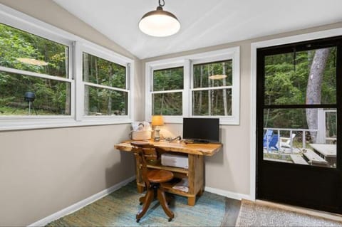Dedicated workspace with a view of the woods