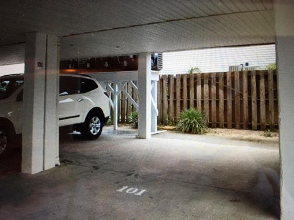 1 parking spot under building, 4 additional "1st come 1st serve" spots in front.