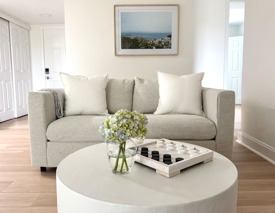 Neutral-toned sofa and soft textures make this space as comfortable as it is stylish. Neutral-toned sofa and soft textures make this space as comfortable as it is stylish. - Peaceful & Convenient 2BR Near Ballantyne - Charlotte