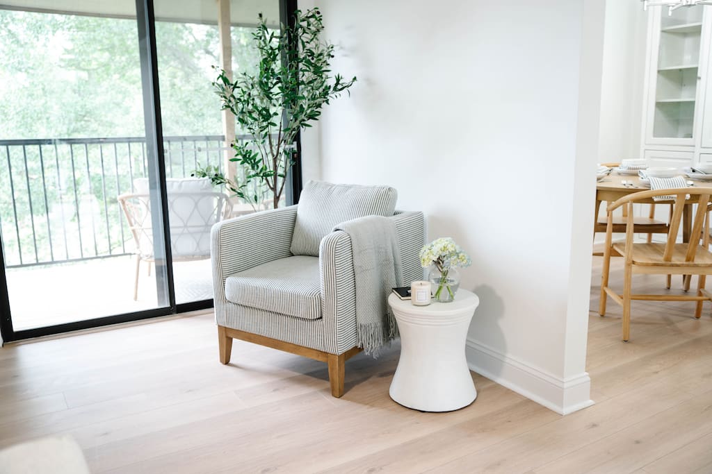 A cozy reading nook near the patio, perfect for a peaceful morning or end-of-day wind down. A cozy reading nook near the patio, perfect for a peaceful morning or end-of-day wind down. - Peaceful & Convenient 2BR Near Ballantyne - Charlotte