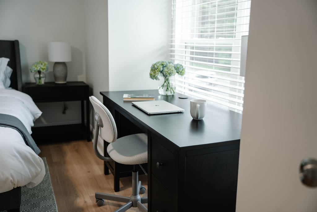 Dedicated desk space with natural light—perfect for morning emails or quiet productivity. Dedicated desk space with natural light—perfect for morning emails or quiet productivity. - Peaceful & Convenient 2BR Near Ballantyne - Charlotte