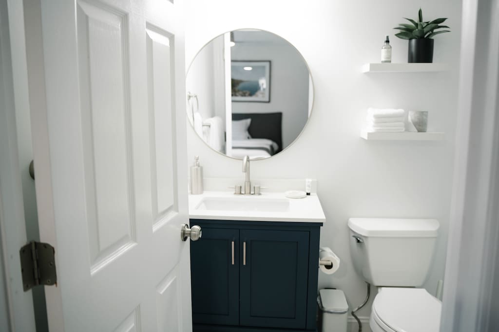 Clean, modern bathroom with sleek fixtures and thoughtful storage. Clean, modern bathroom with sleek fixtures and thoughtful storage. - Peaceful & Convenient 2BR Near Ballantyne - Charlotte