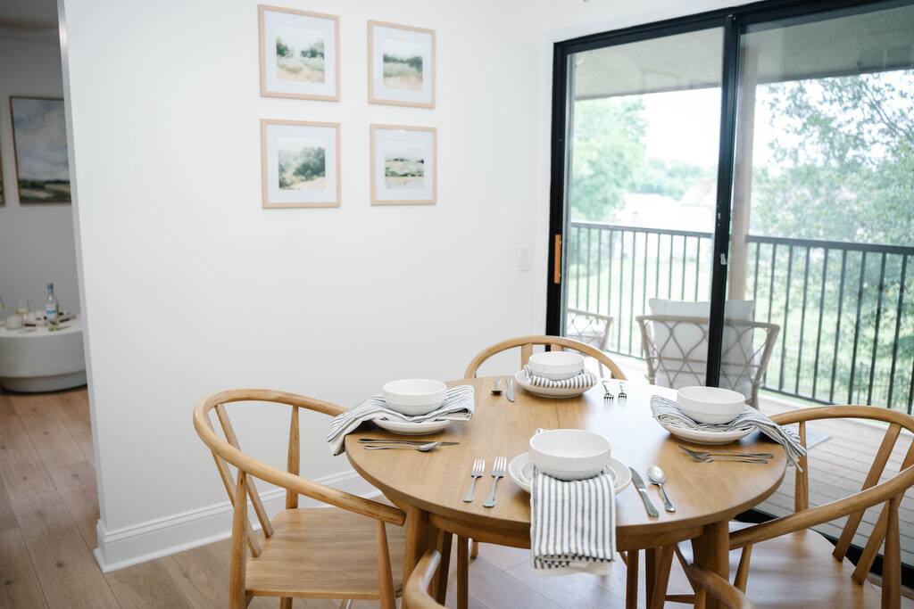 Peaceful dining space with outdoor access—ideal for slower mornings or a cozy dinner in. Peaceful dining space with outdoor access—ideal for slower mornings or a cozy dinner in. - Peaceful & Convenient 2BR Near Ballantyne - Charlotte